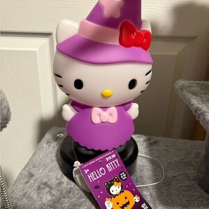 Hello Kitty Purple Witch Figurine with Red Bow